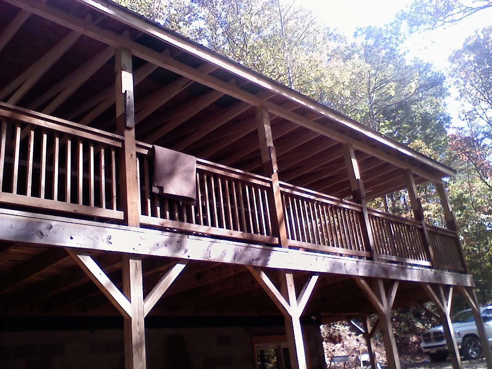 Timber framing under a new elevated porch and deck — Roof Leak Repair in Huxley by Roofing Brothers